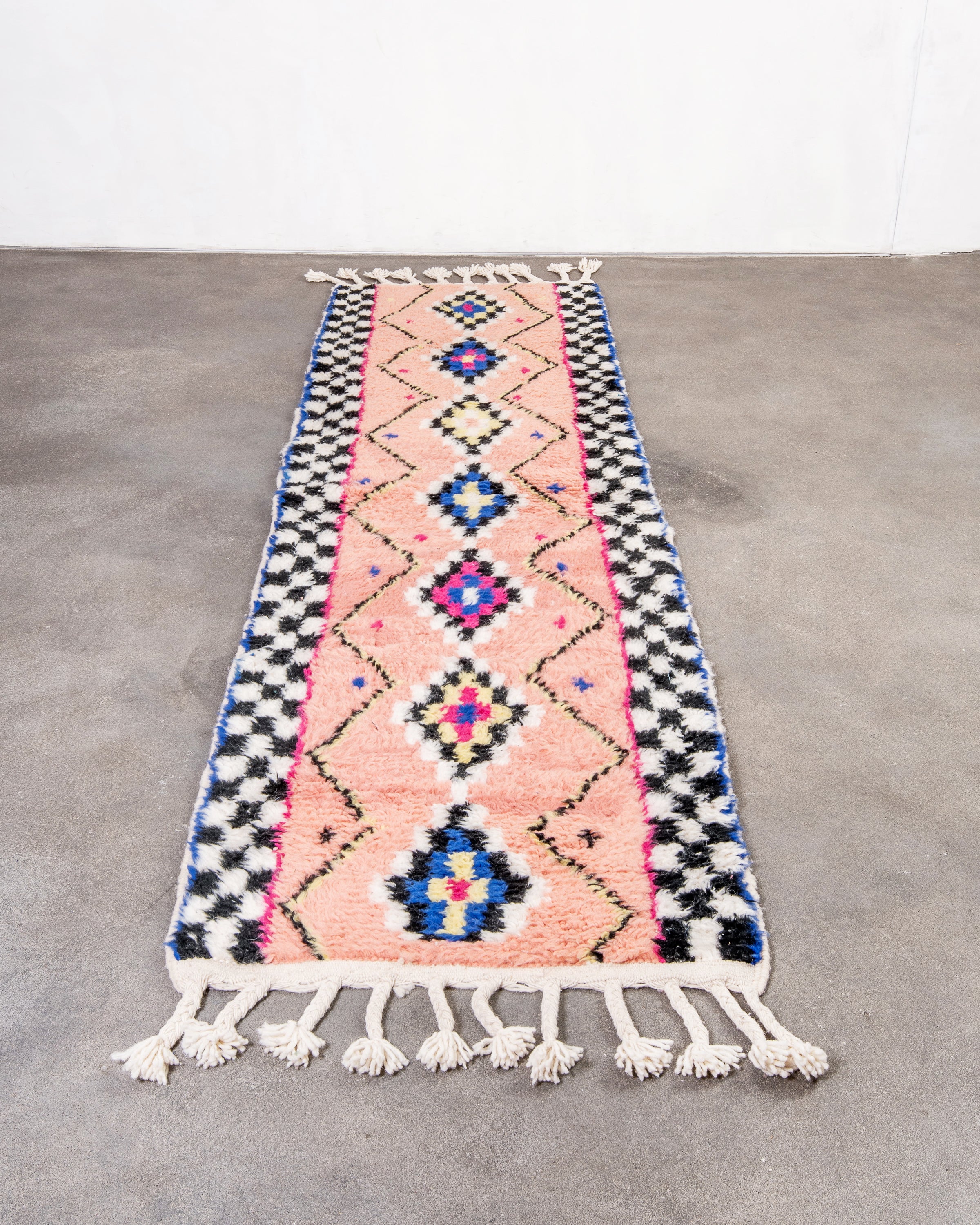 Modern, designer, handcrafted Berber rug from Morocco. Beniourain carpet with beautiful colors and patterns and fluffy wool texture.
